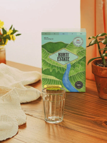 pouring kurti tea to glass